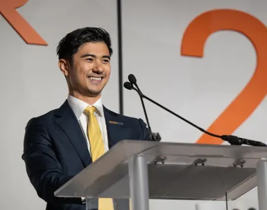 Dr. Kekoa Taparra speaking at the Evening to Conquer Cancer event at the 2024 ASCO Annual Meeting.