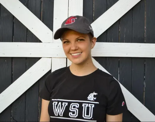 Emma Lande in a baseball hat