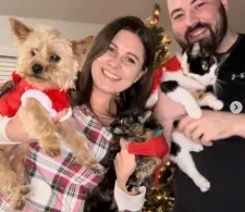 Katie and husband with pets