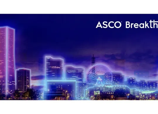 ASCO Breakthrough logo on top of an illustrated design of Yokohama, Japan. The city appears in neon, lurid colors of indigo, violet, and light blue.